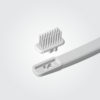 how to fix in the small brush head to the brush