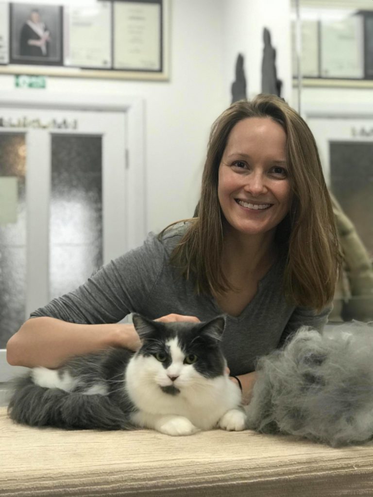 Lady with cat after grooming, Absolutely Animals